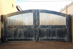 Custom double privacy gate with faux finish.