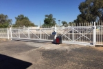 Large cantilever gate with solar gate operator.