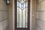 Artisan Series Security Door, FLW V2 finished in Copper Vein.